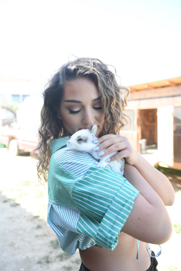 me holding a baby rabbit in Paliomexo, one of the many Cyprus villages