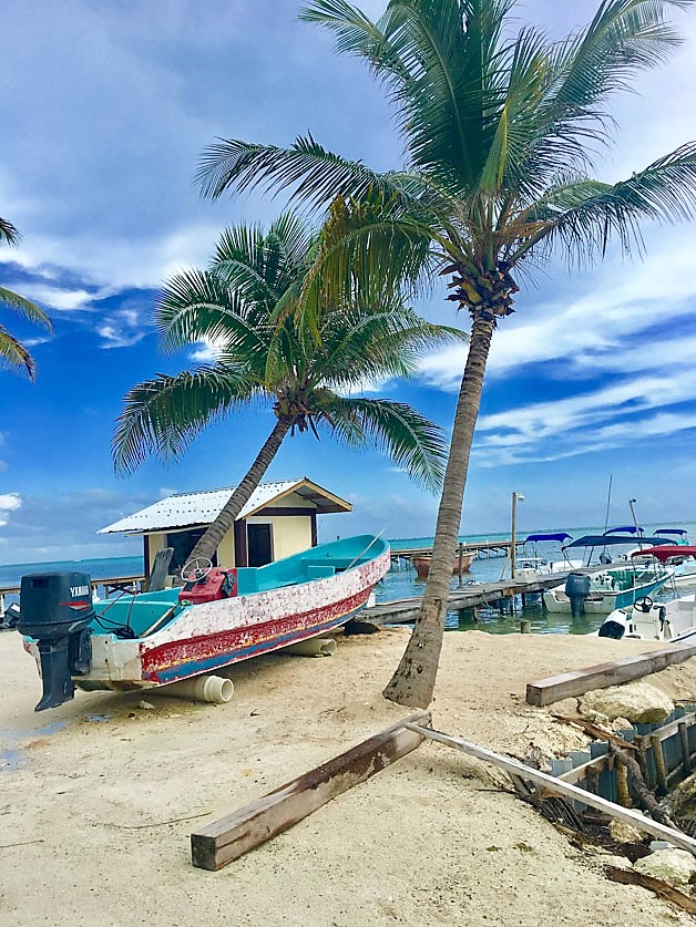 boats on a port in Belize - Belize fun facts 