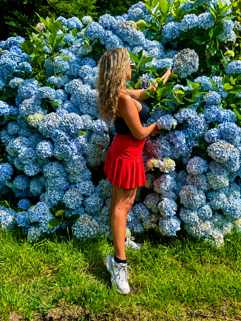 Blue hydrangeas blooming in the lush landscape of São Miguel, Azores