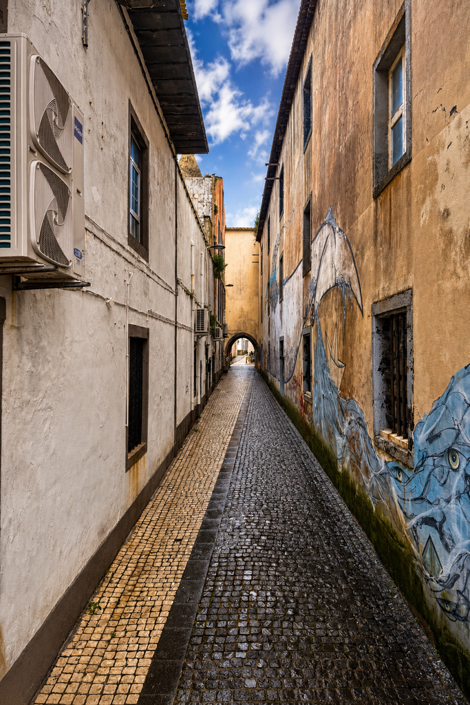 narrow atmospheric old-town alley in ponta delgada
