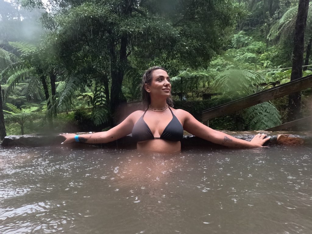 Enjoying a thermal pool in the rain at Caldeira Velha, São Miguel, Azores